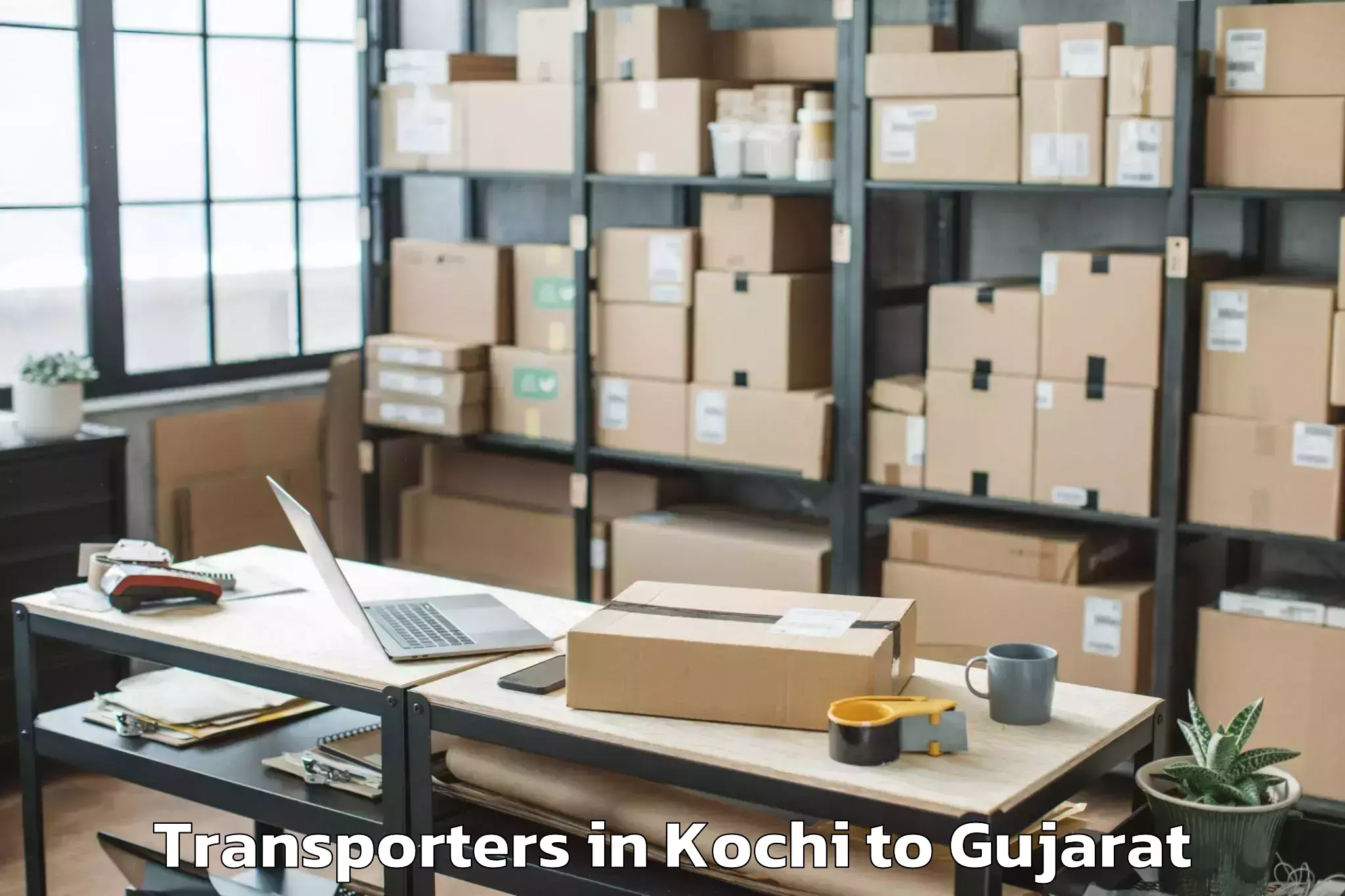 Top Kochi to Sachin Transporters Available